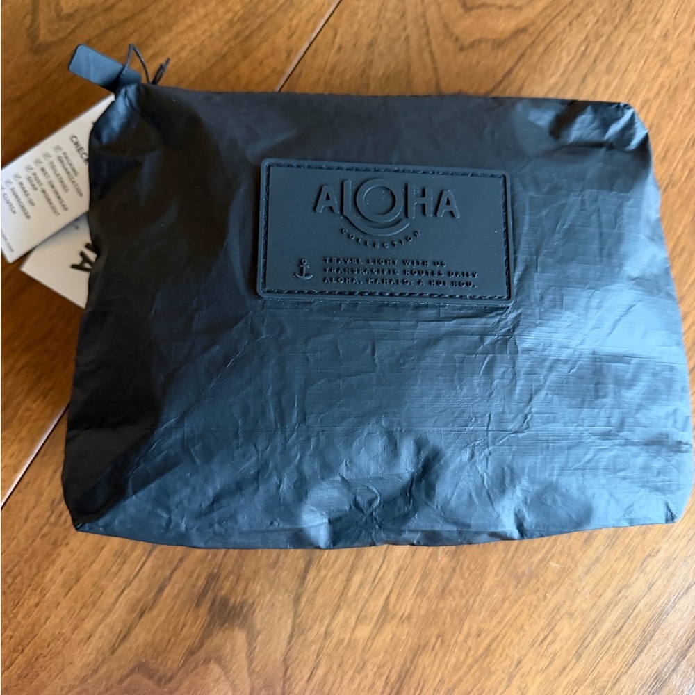 ALOHA Collection Black Embossed Logo Pouch